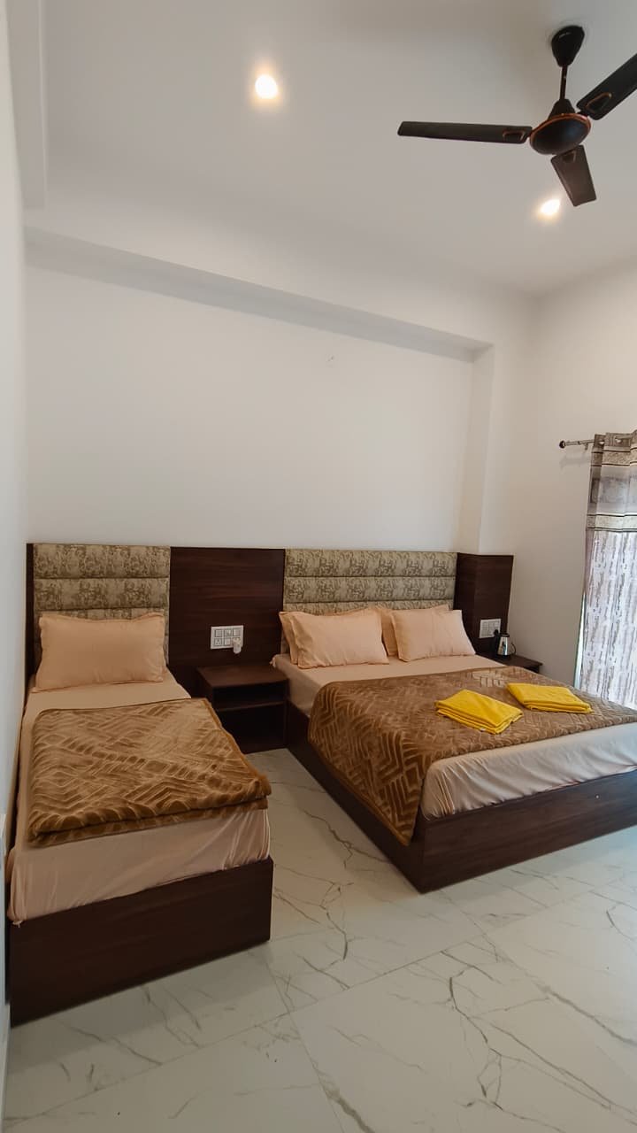 Hotel Dhangauri Uttarkashi — panoramic Ganga and Himalayan view